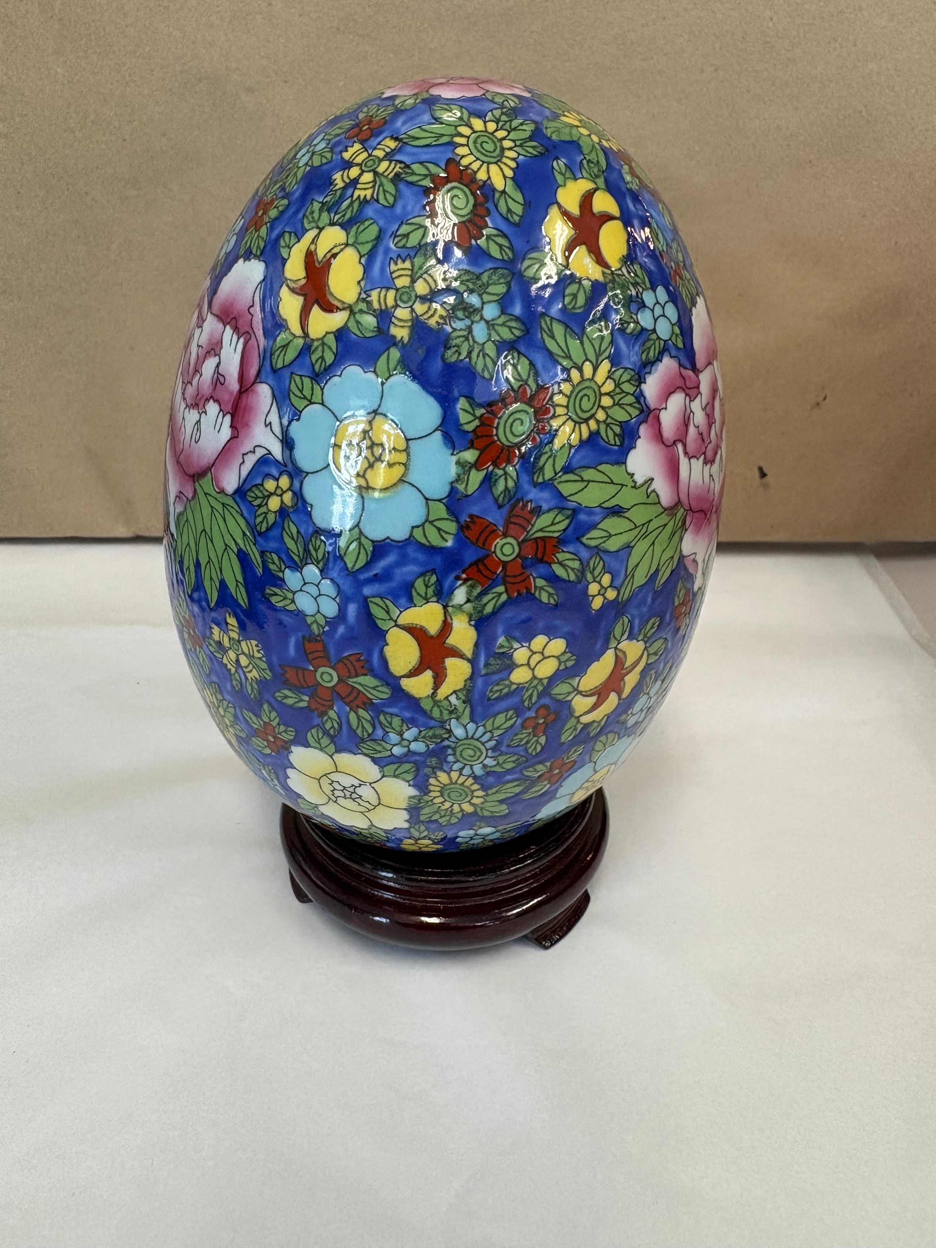 Large hand painted enameled egg with stand
