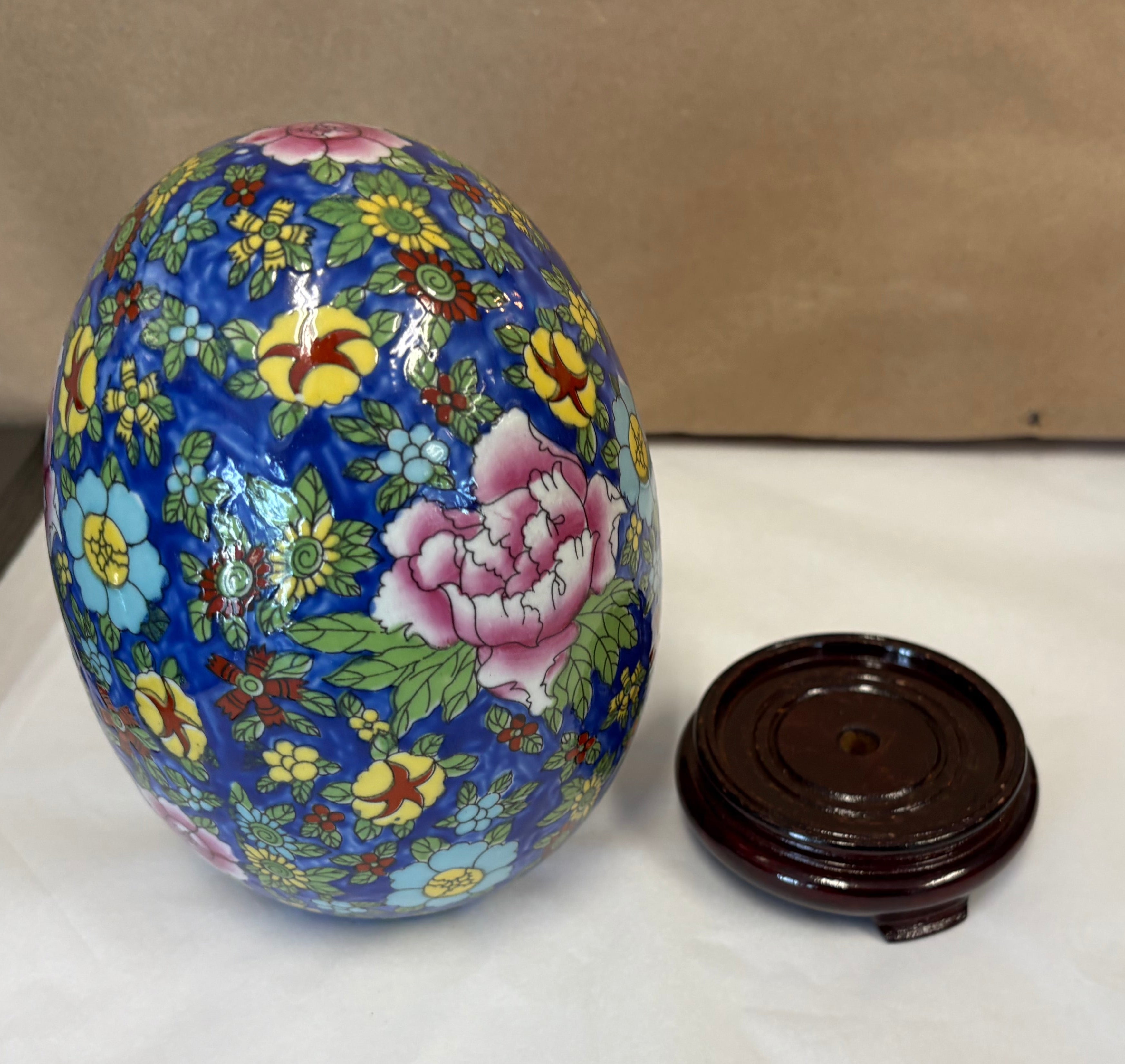 Large hand painted enameled egg with stand
