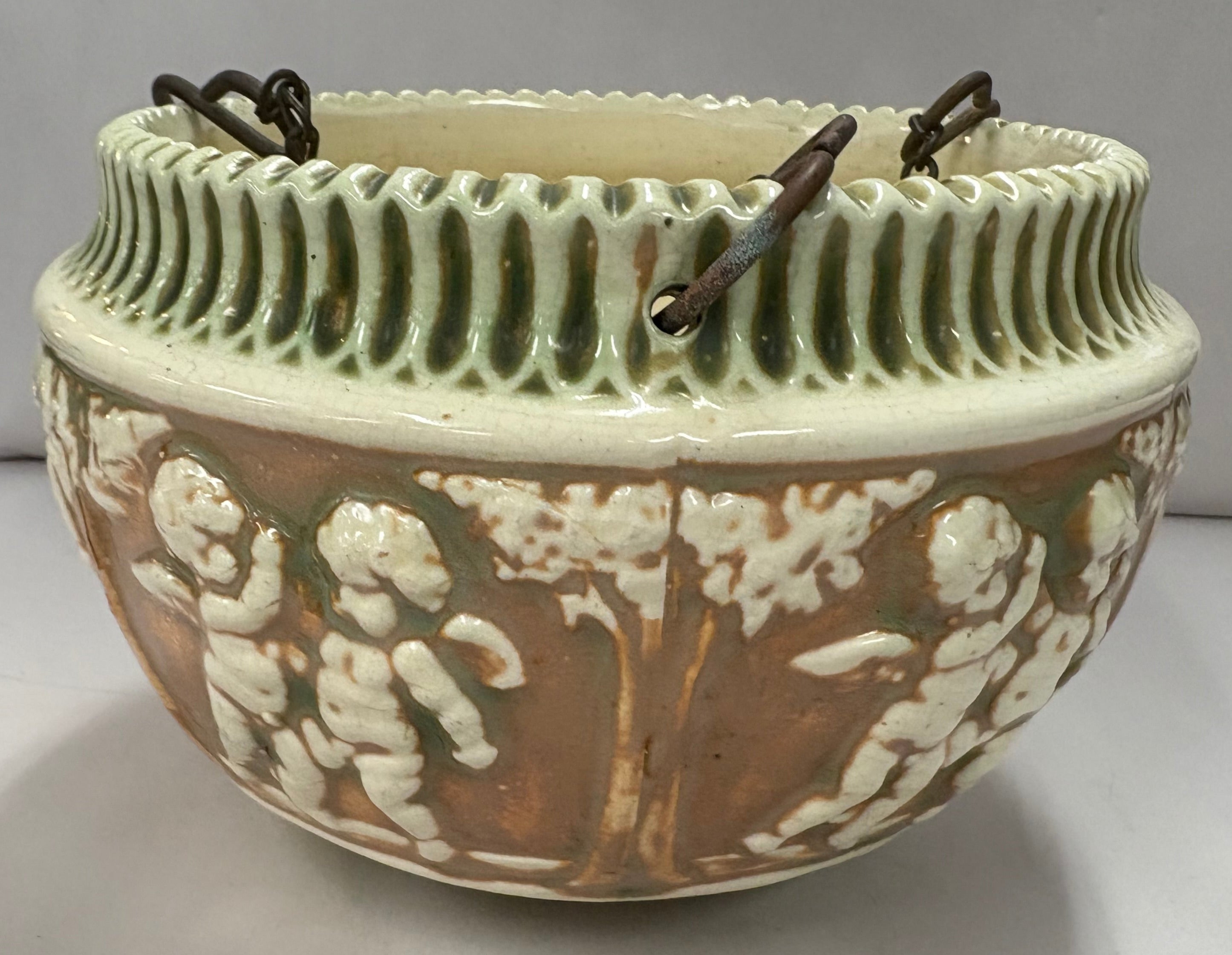 Vintage Roseville Donatello pot with Cherubs