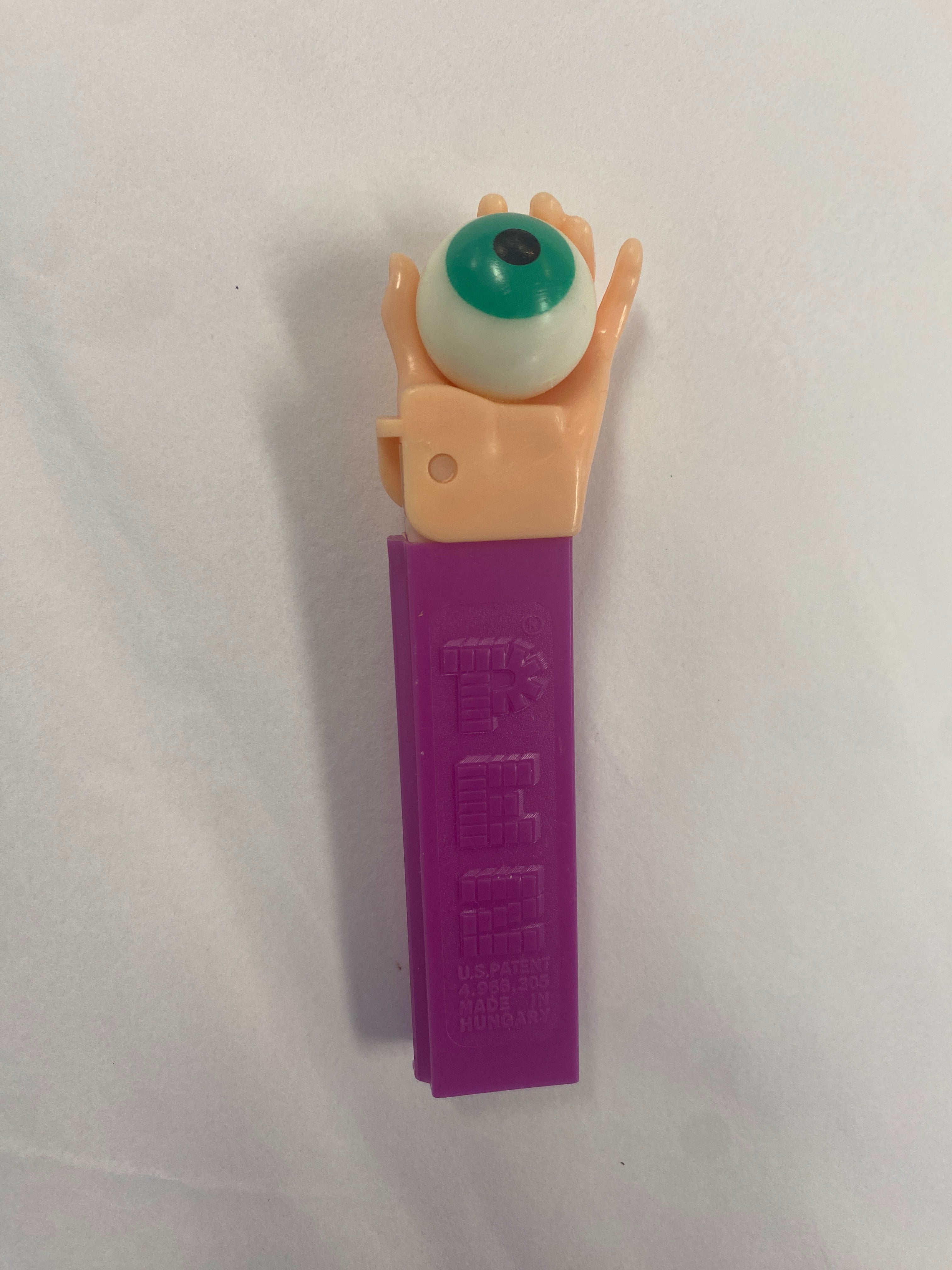 pez dispenser, pez candy, vintage, collectible, psychedelic eyeball