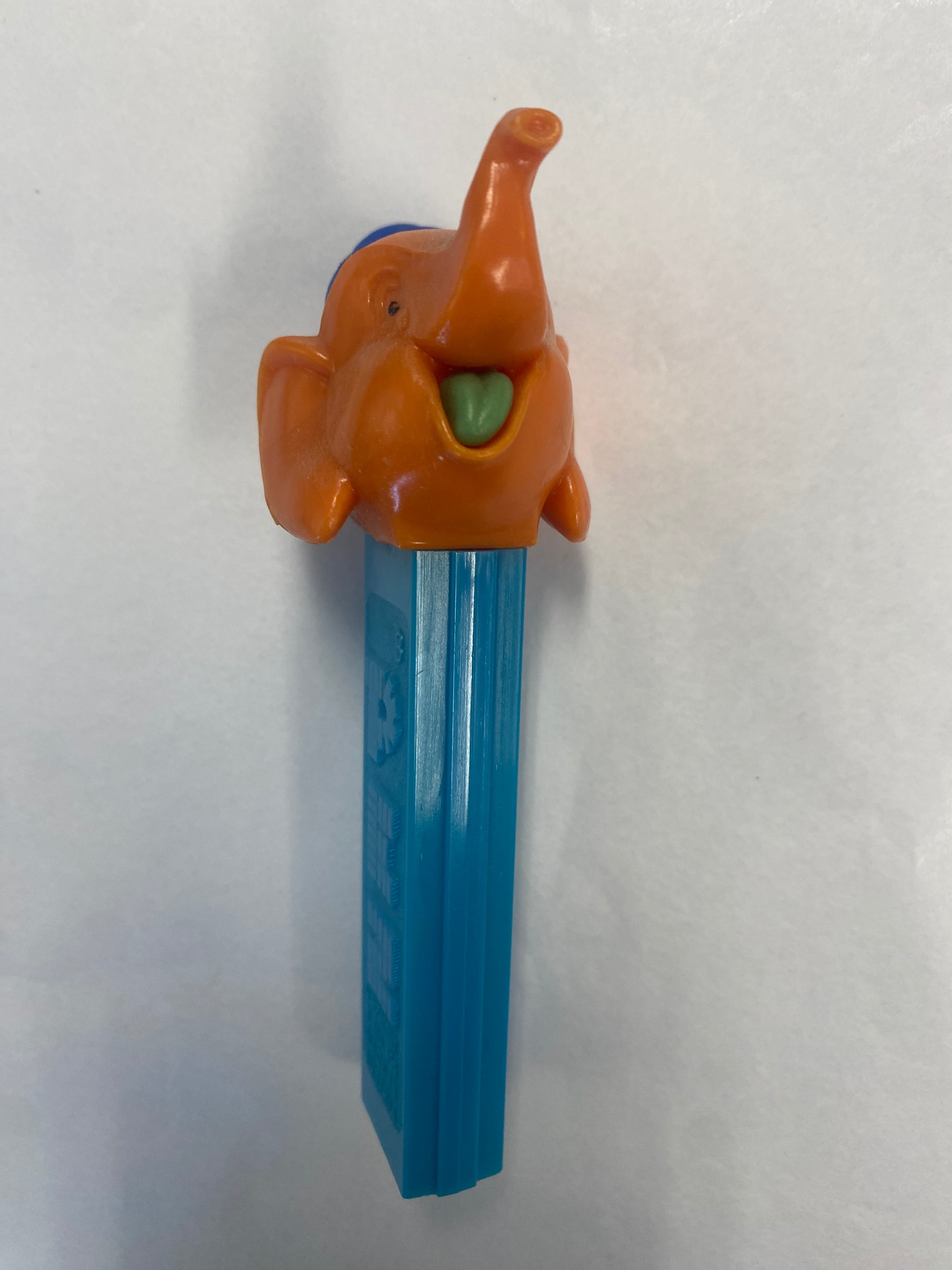 pez dispenser, pez candy, collectible, vintage, orange face elephant.