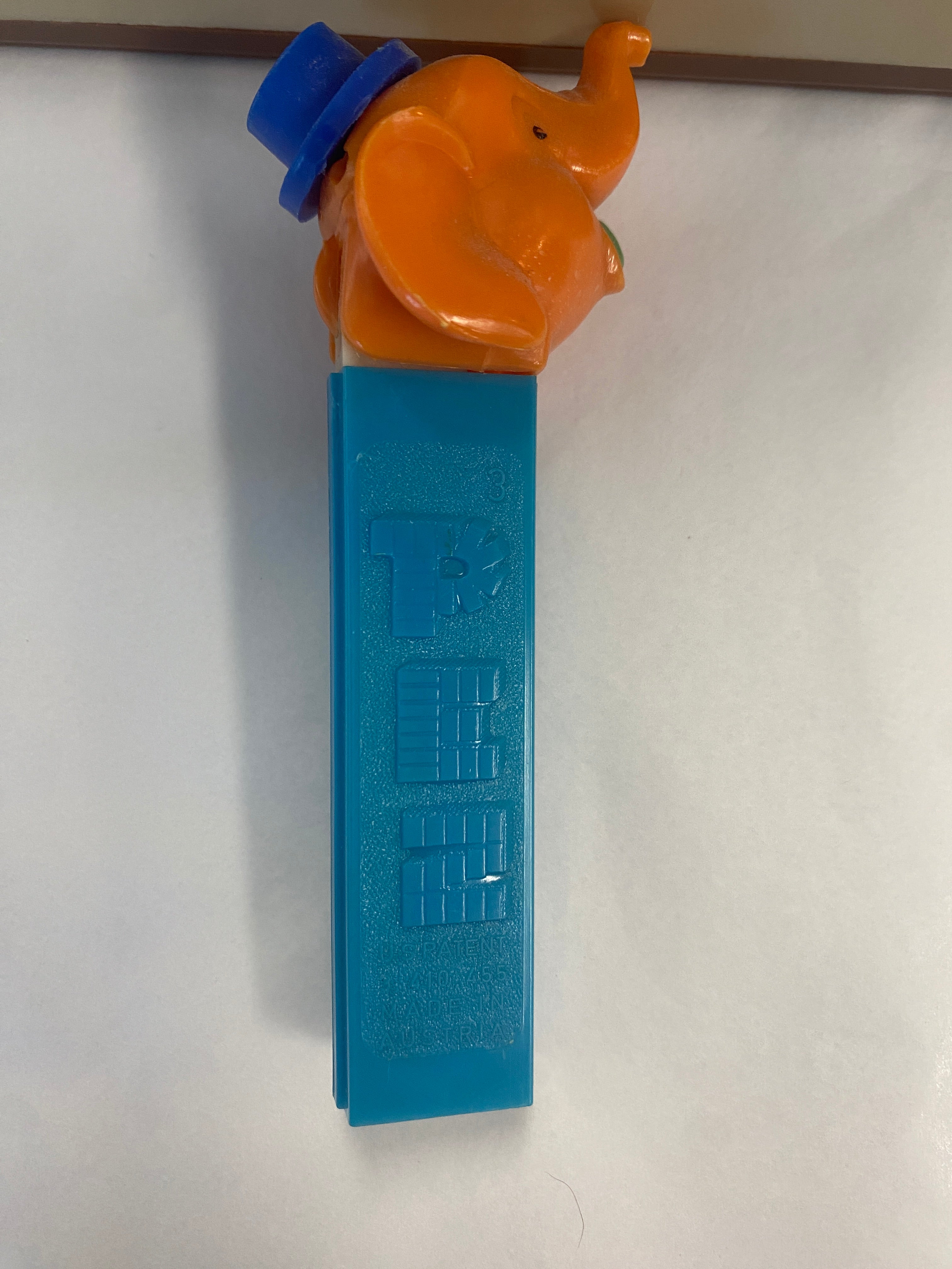 pez dispenser, pez candy, collectible, vintage, orange face elephant.