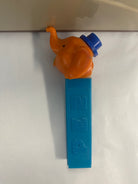 pez dispenser, pez candy, collectible, vintage, orange face elephant.
