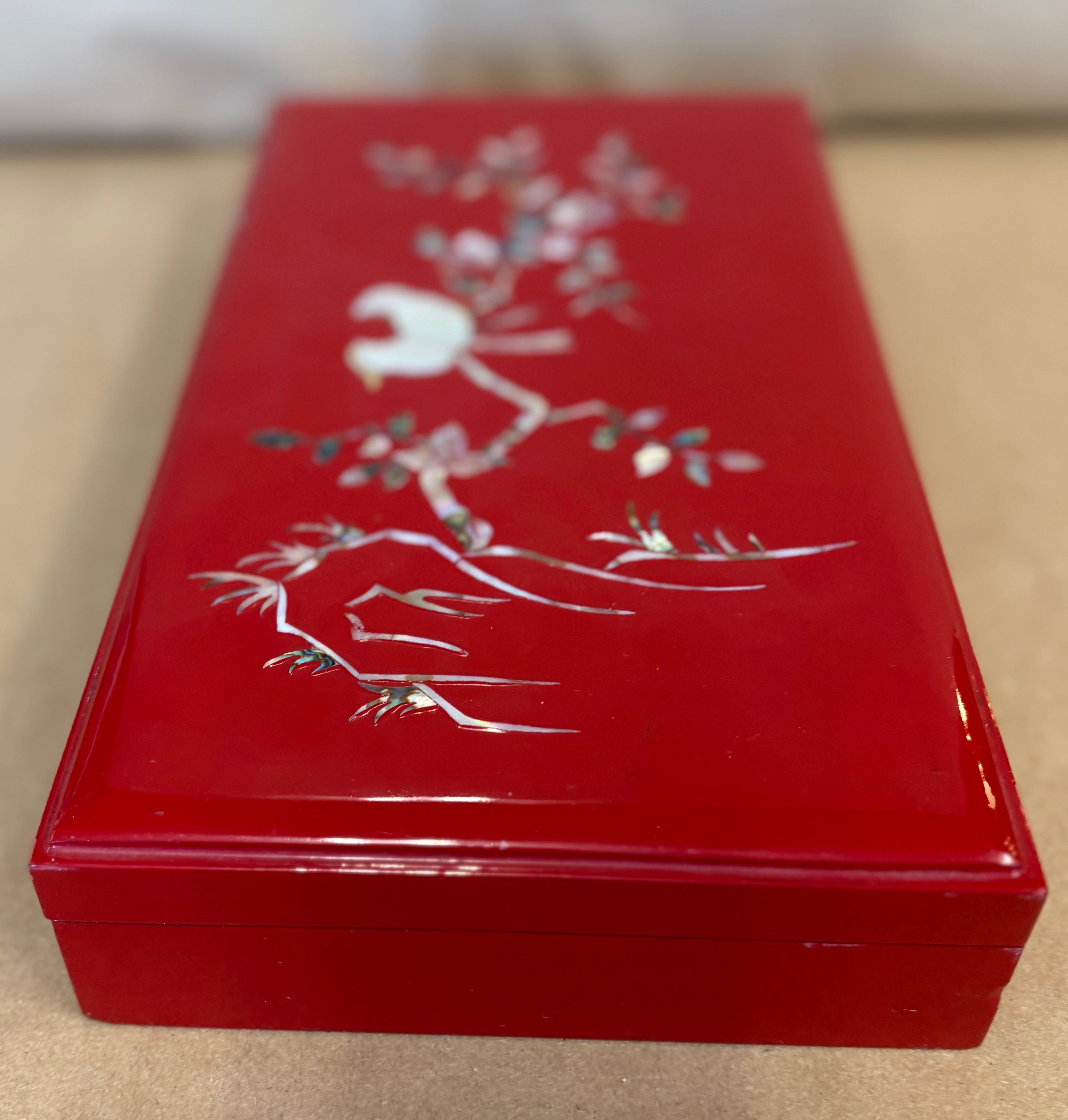 Red lacquer cigarette box with mother of pearl
