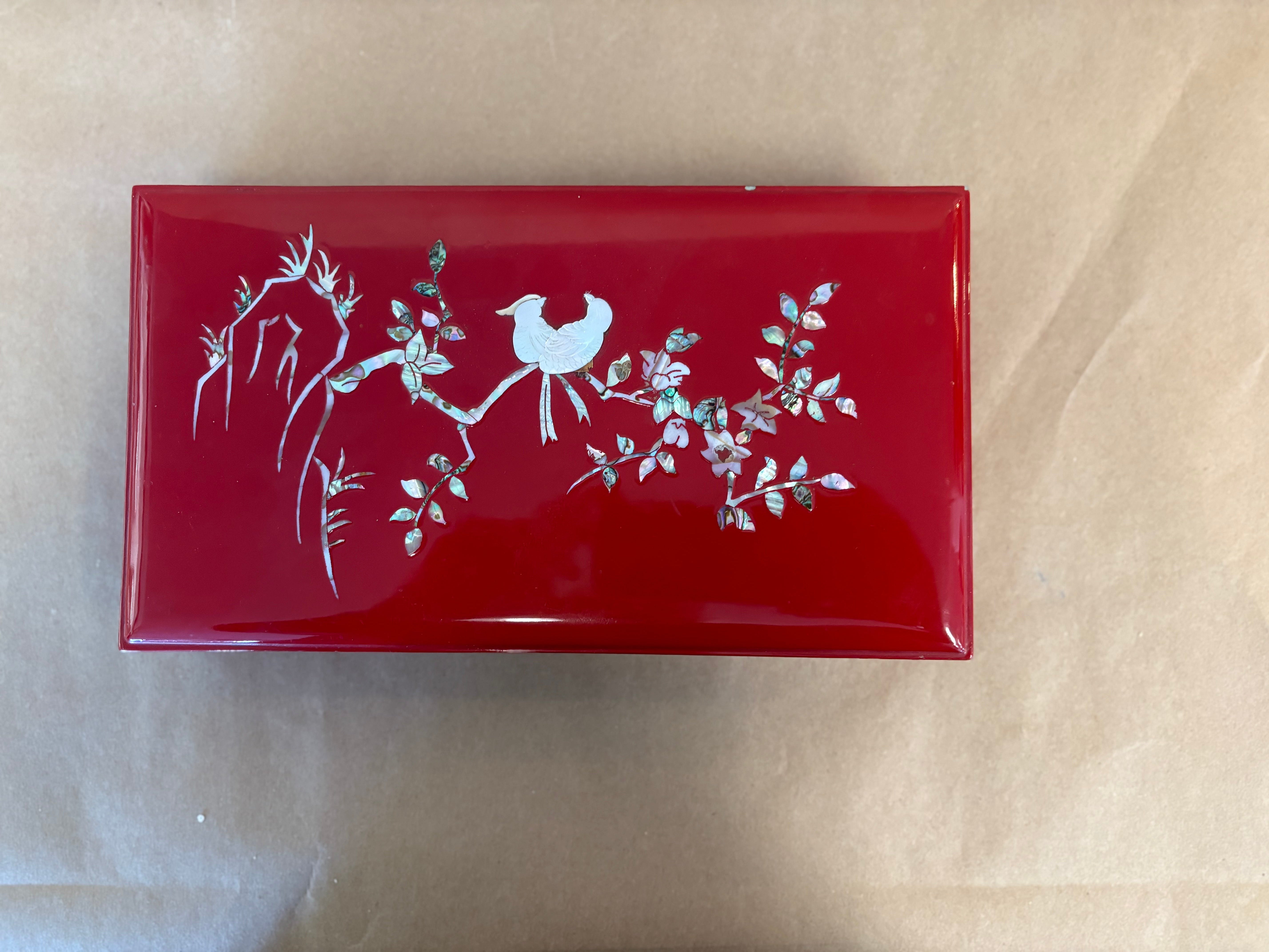 Red lacquer cigarette box with mother of pearl
