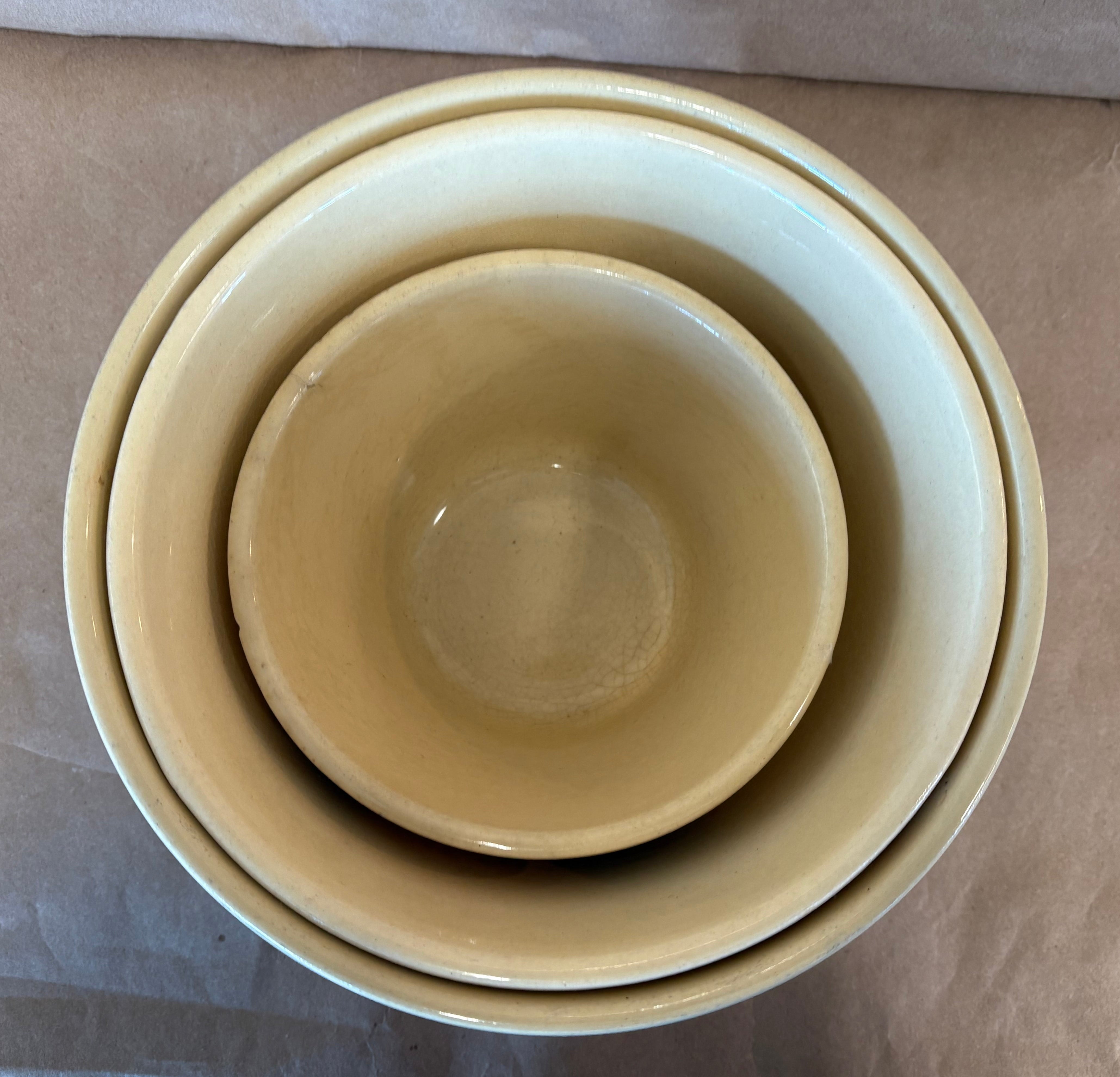 Set of three Watt Ware rippled apple nesting bowls