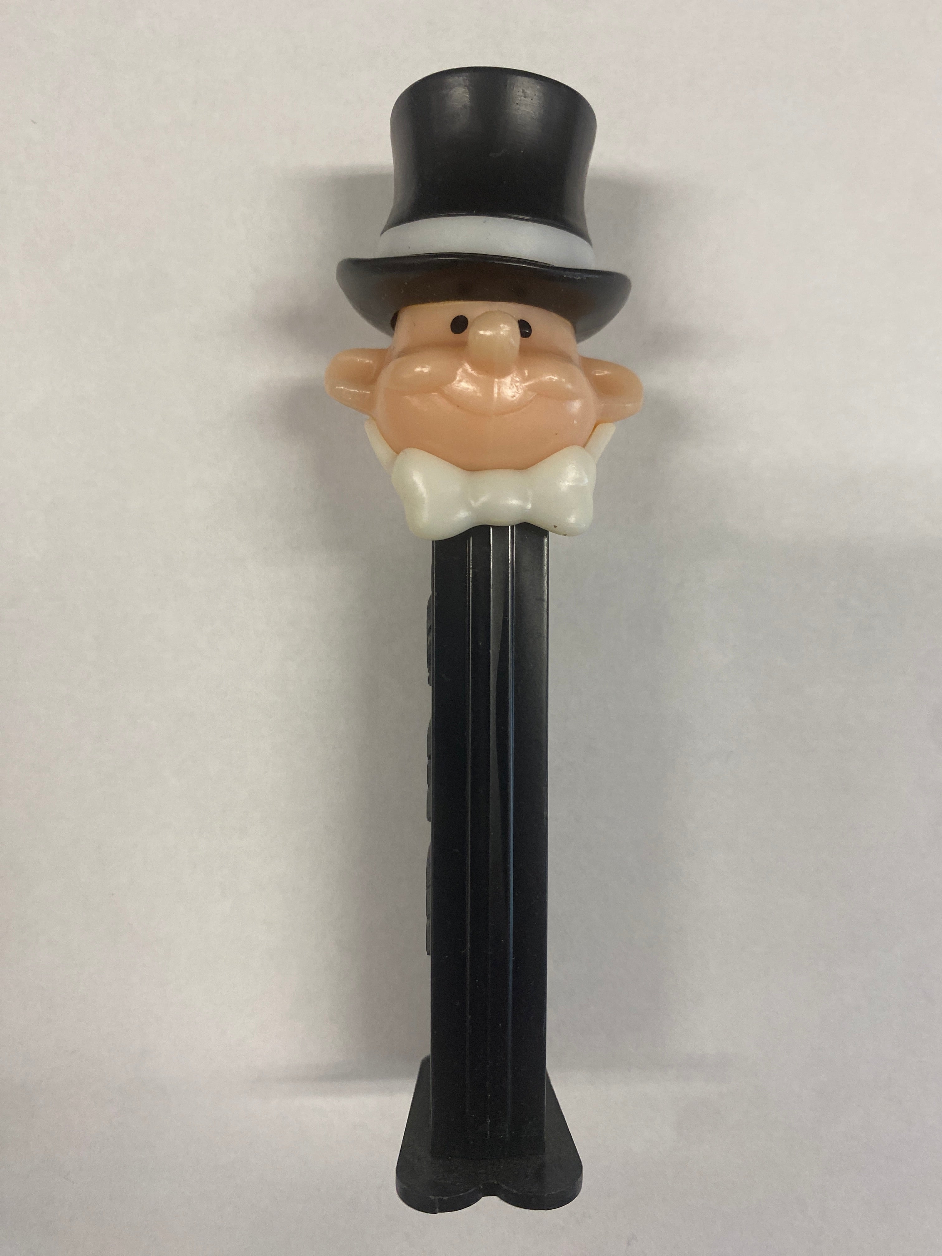pez, pez dispenser, pez candy, collectible, vintage , groom, black and white