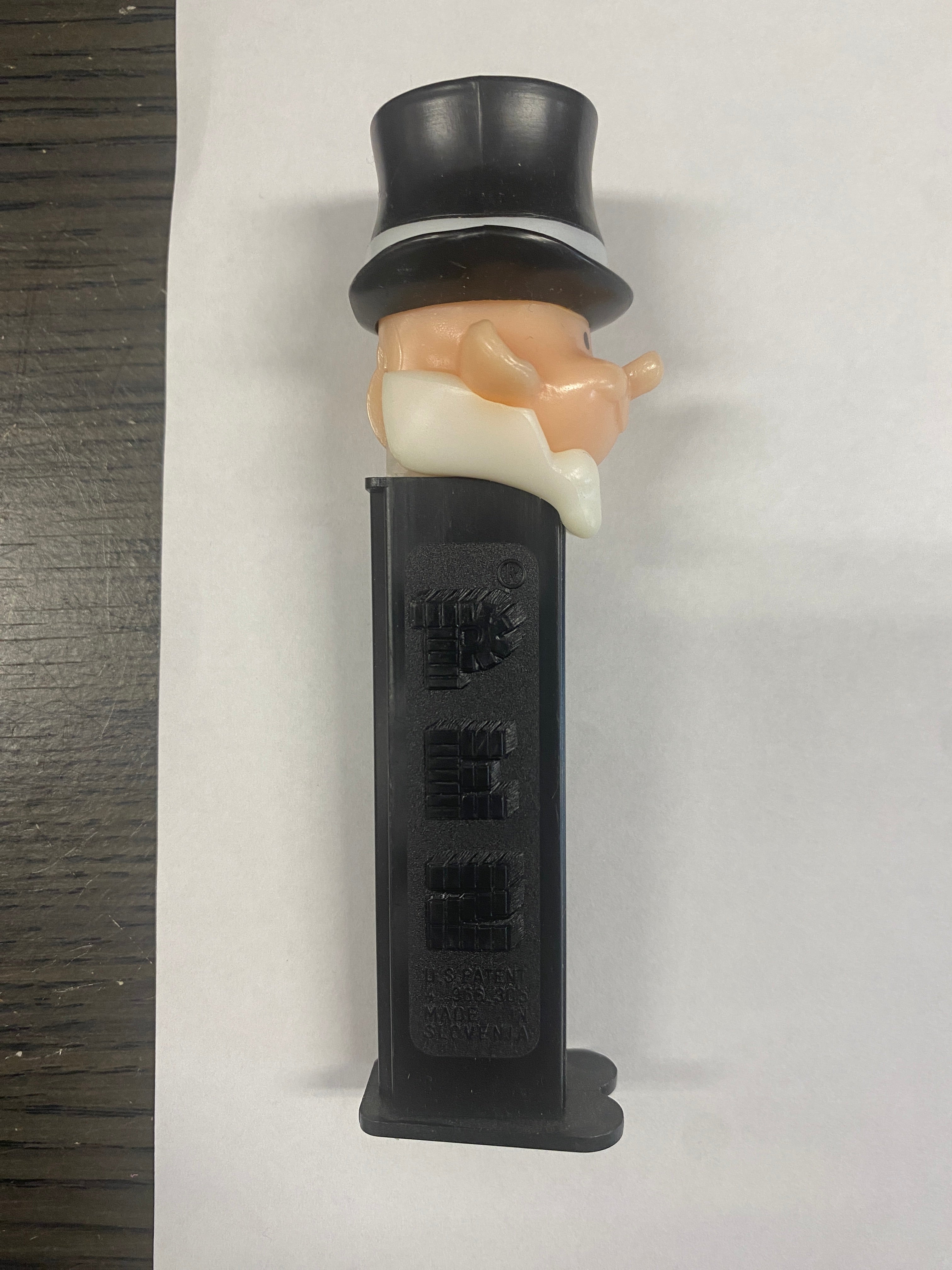 pez, pez dispenser, pez candy, collectible, vintage , groom, black and white