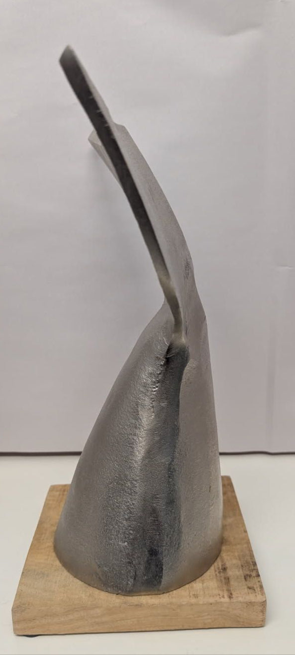 Silver Whale's Tail on wood base