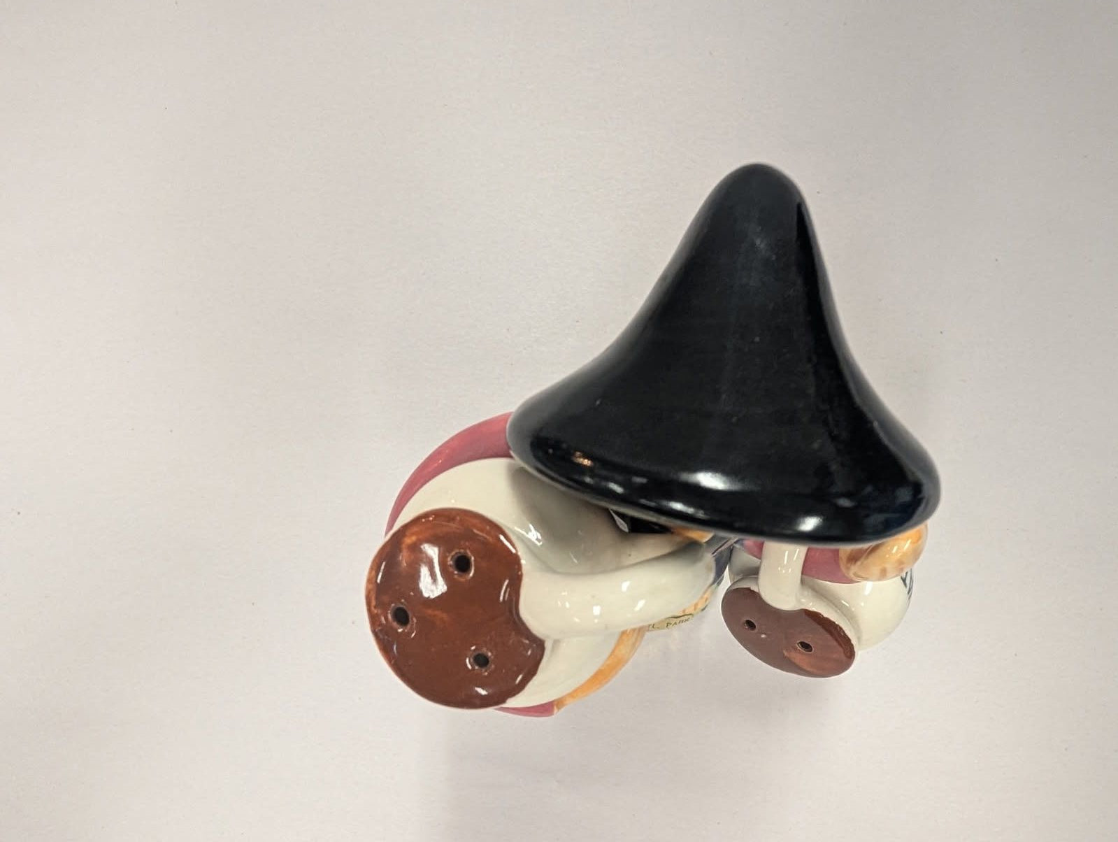 Salt & pepper shaker of an oriental man carrying jugs