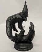 2 Bronze clown acrobats. 