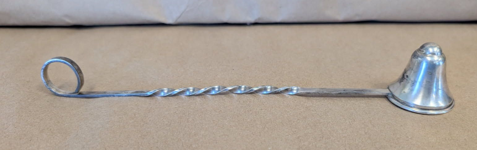 Randahl Shop sterling silver candle snuffer